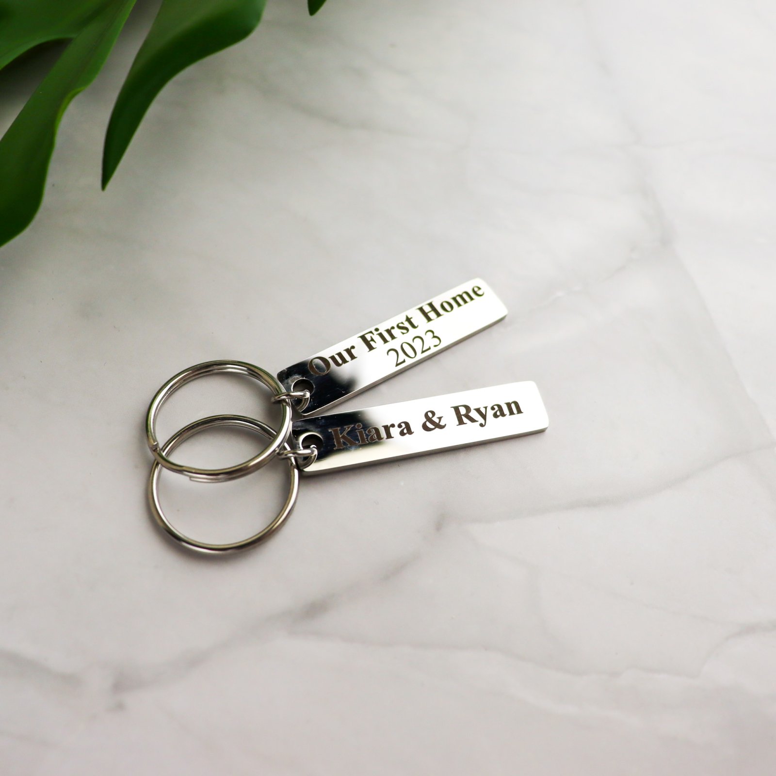 Our first home metal bar keyring