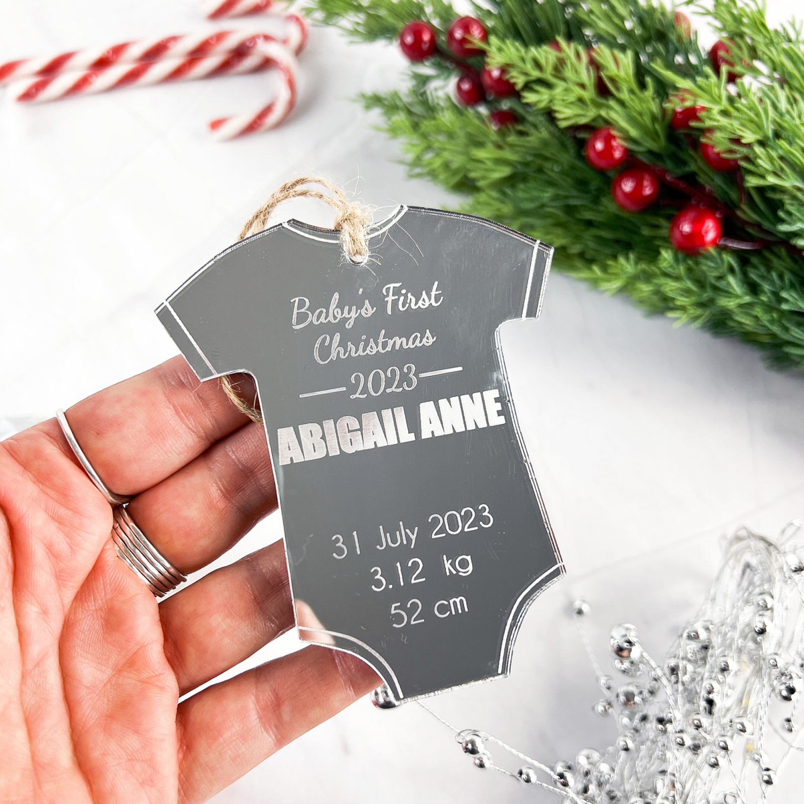 Baby's first christmas bodysuit ornament