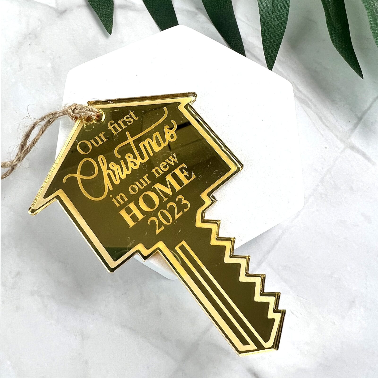 First christmas house key ornament