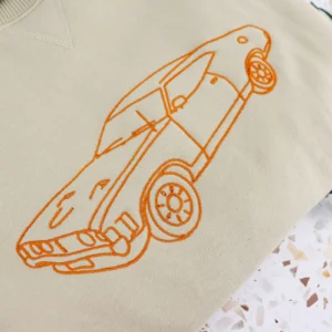 Car outline embroidered jumper / crewneck sand