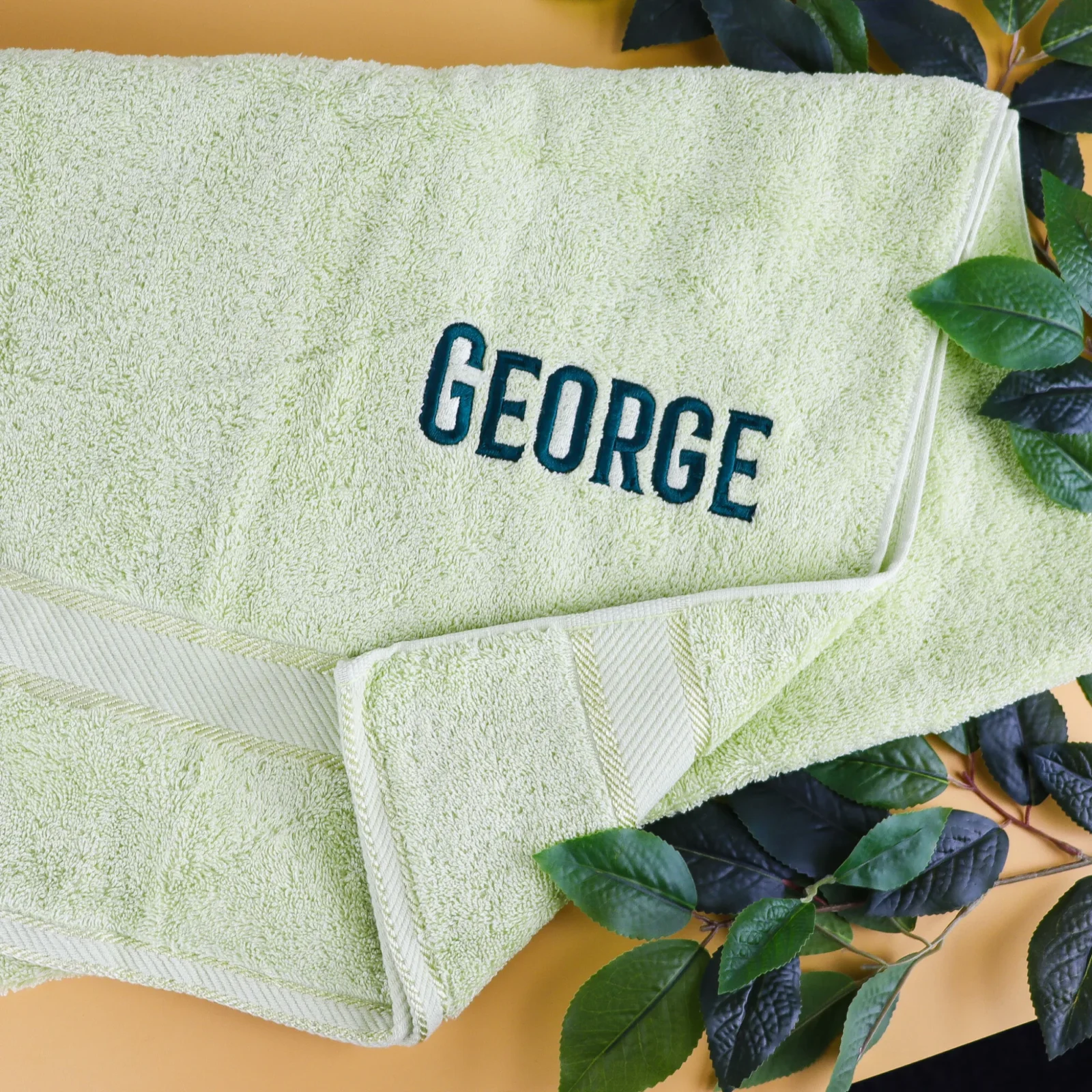 Apple green embroidered bath towel