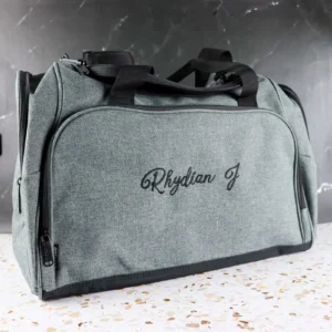 Embroidered grey duffle bag with personalised design