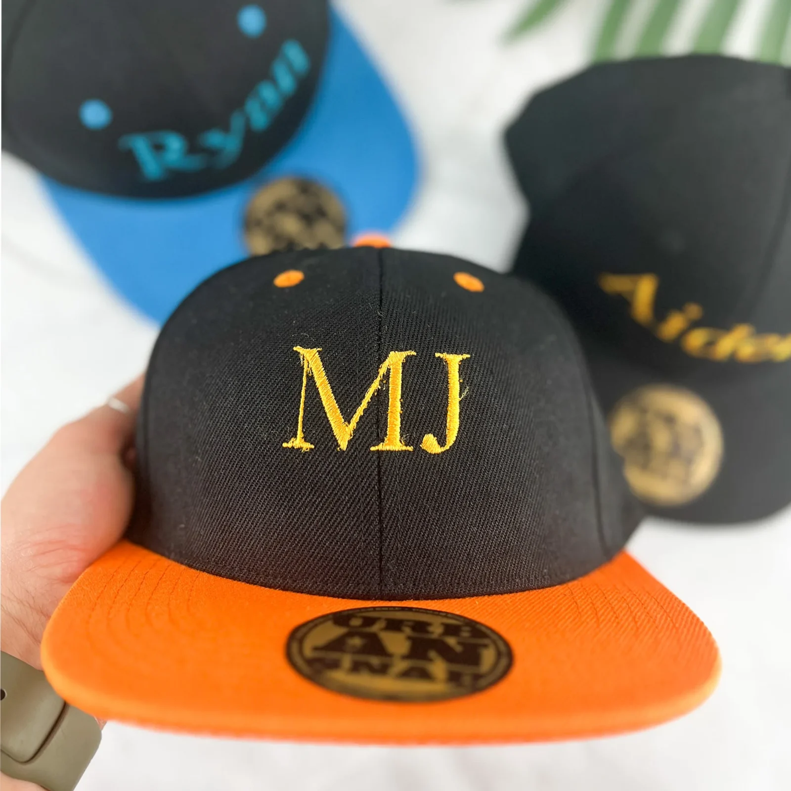 Embroidered snapback cap with choice of font