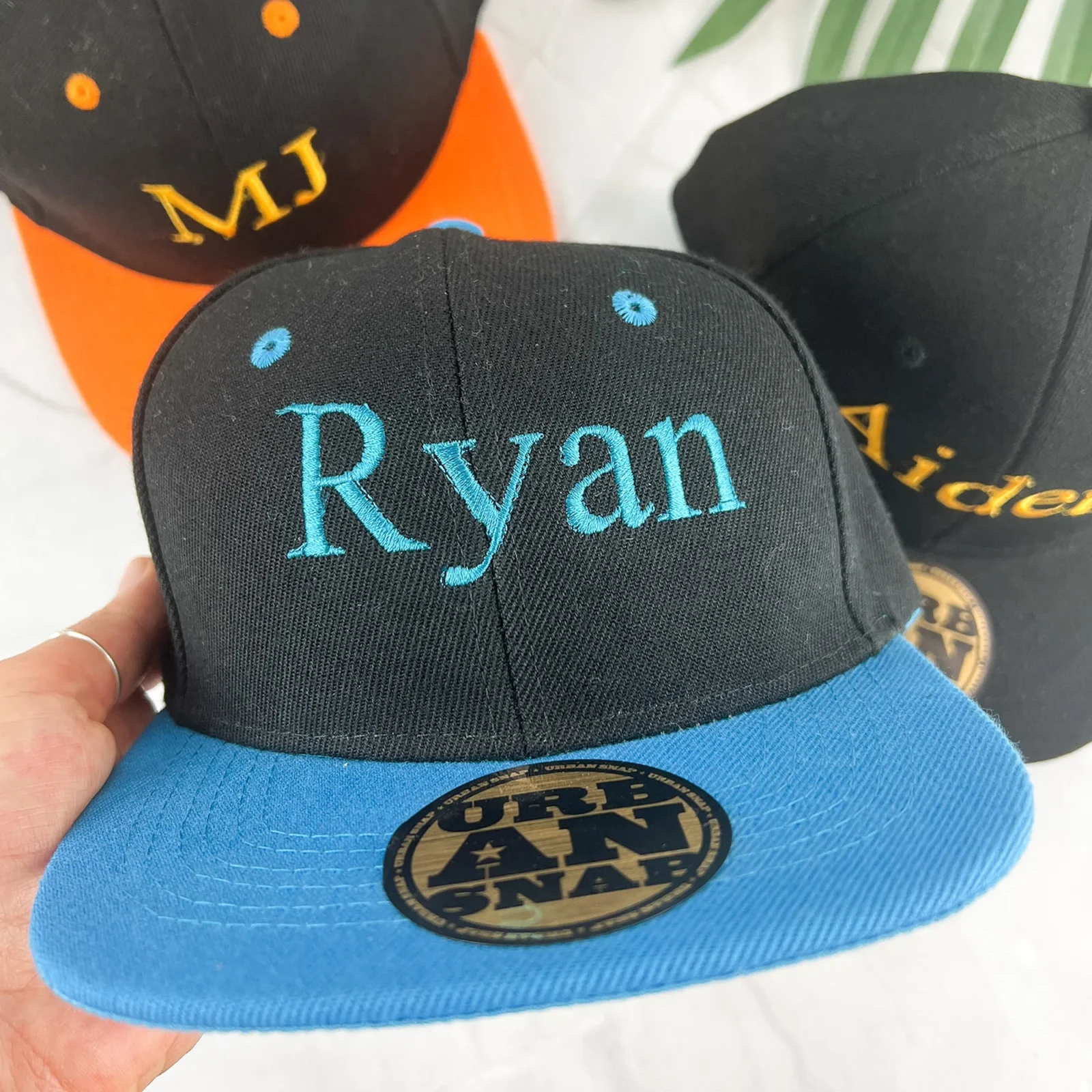 Embroidered snapback cap with choice of font