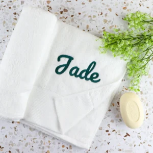 White embroidered bath towel