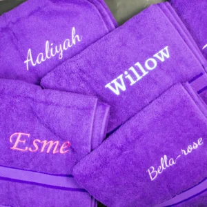 Purple embroidered bath towel